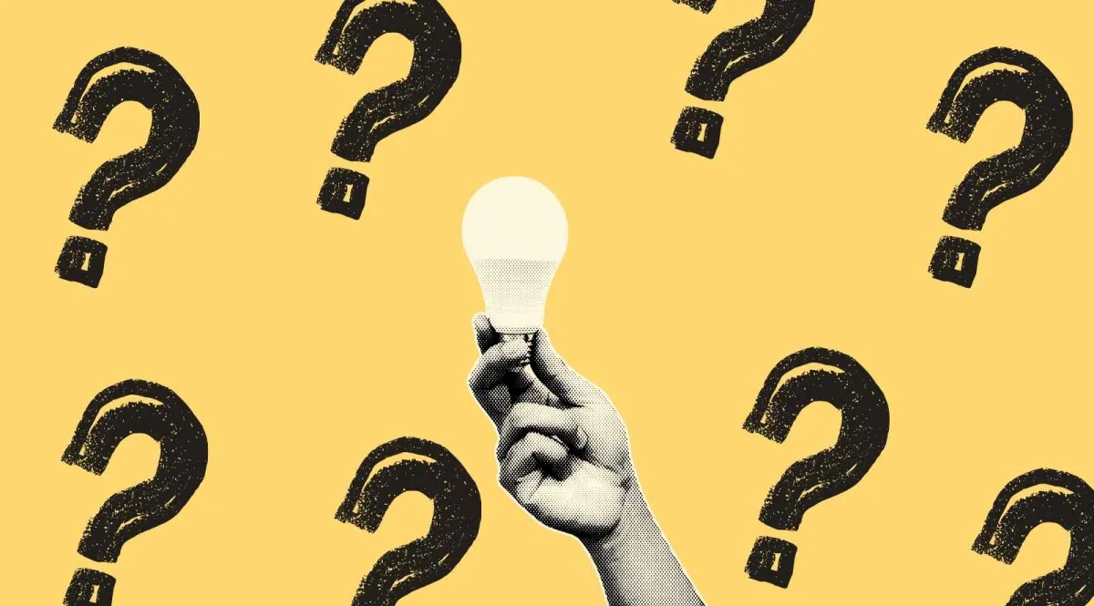 Man holding a lightbulb in his hand