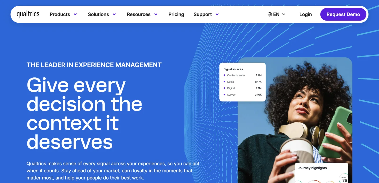 Qualtrics XM employee experience dashboard showing predictive attrition signals and Text iQ comment themes